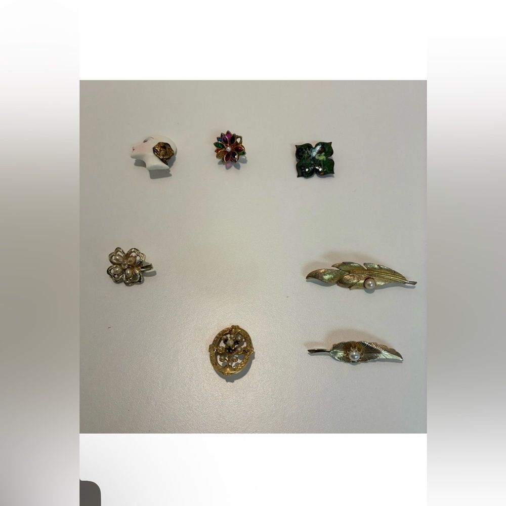 Vintage brooches.  Get all 7.   $6 per pin and only 1 shipping fee